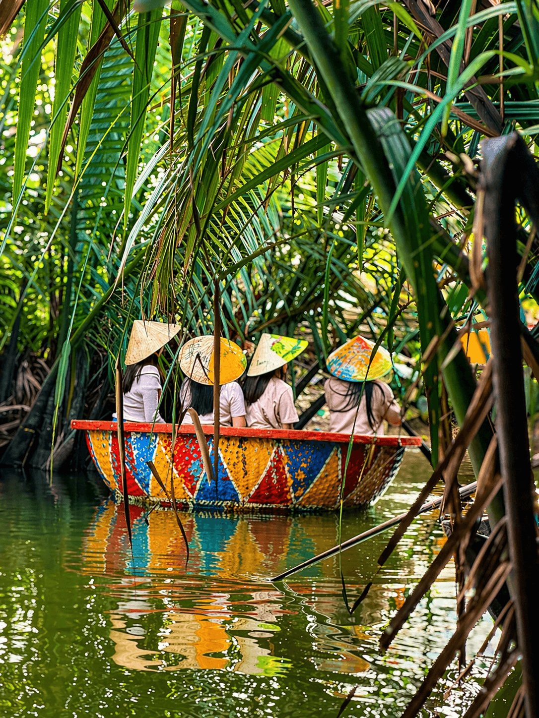 Guests enjoying coconut boat Hoi An experience with local guides and fun activities