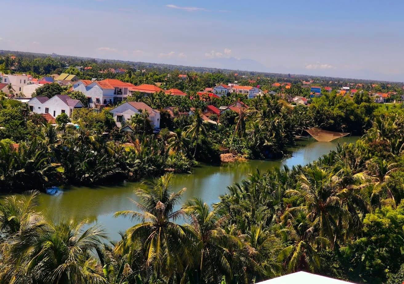 Family enjoying coconut boat Hoi An eco tour near Hoi An ancient town